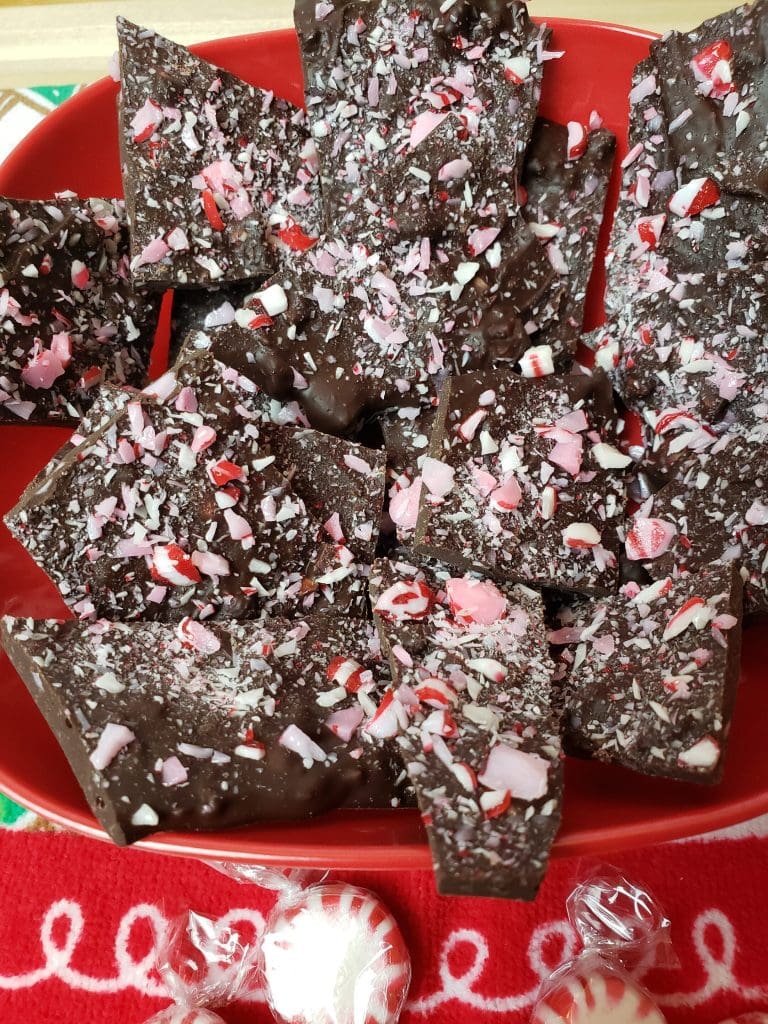 Keto chocolate peppermint bark on a red plate.