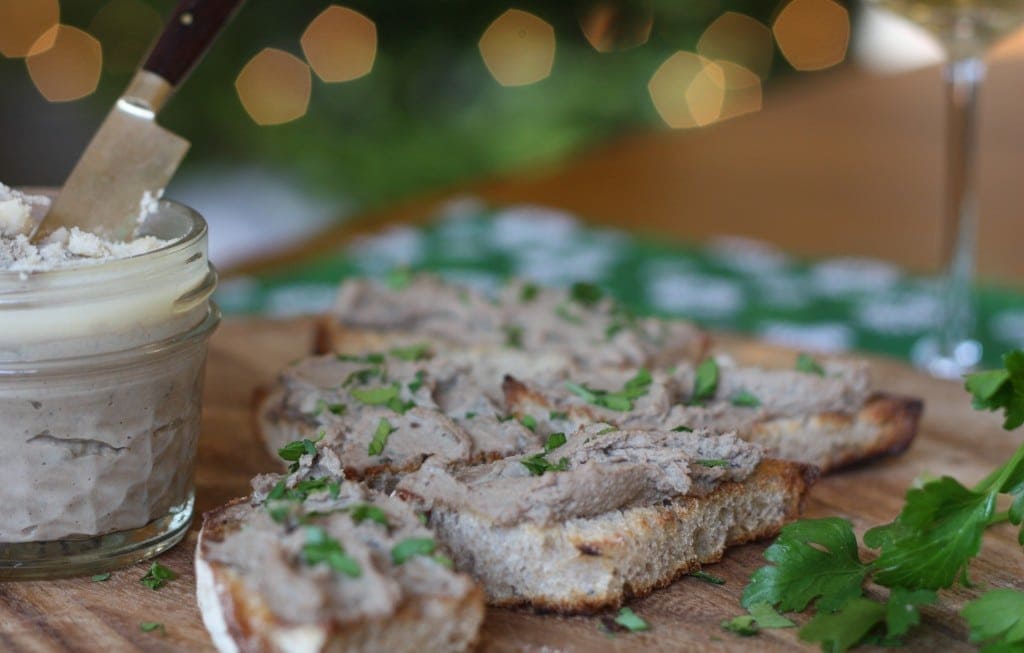 Chopped liver recipe on a wooden board.