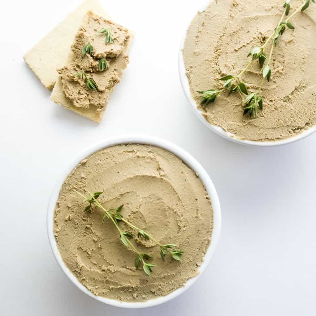 Two bowls of chicken liver pate.