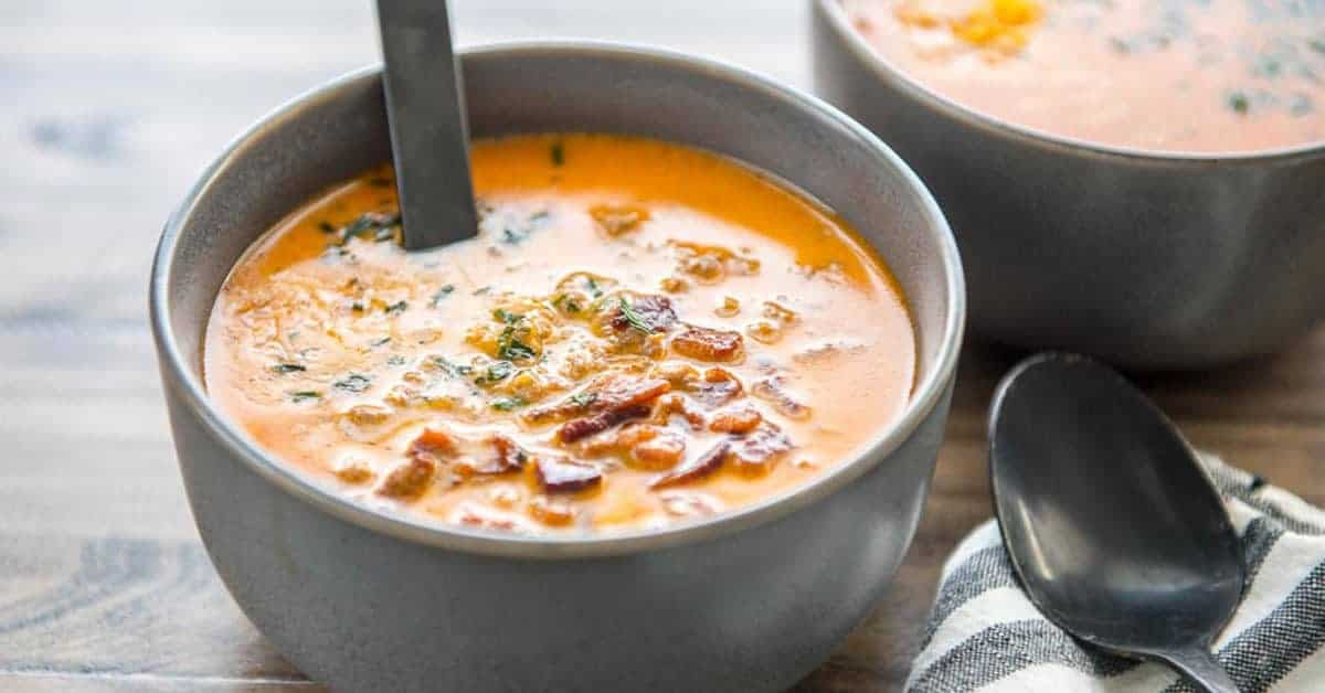Easy low carb cheeseburger soup in a bowl with spoon.
