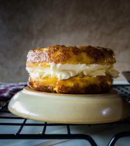 English muffin chaffle on upside down plate.