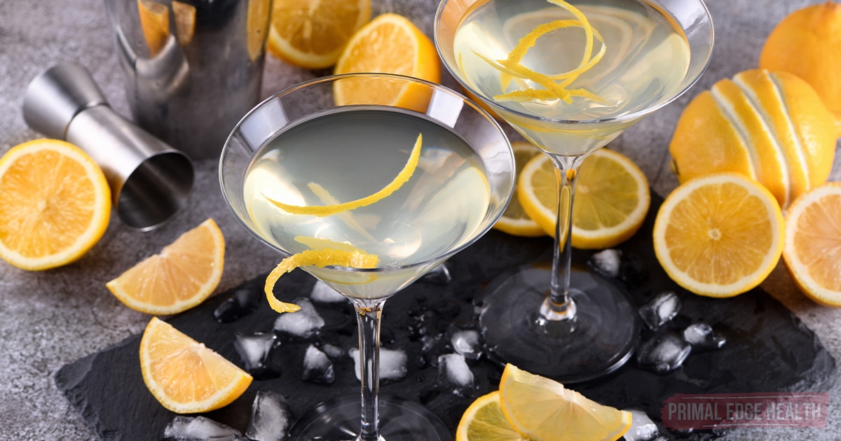 Two lemon drop cocktails garnished with lemon slices.