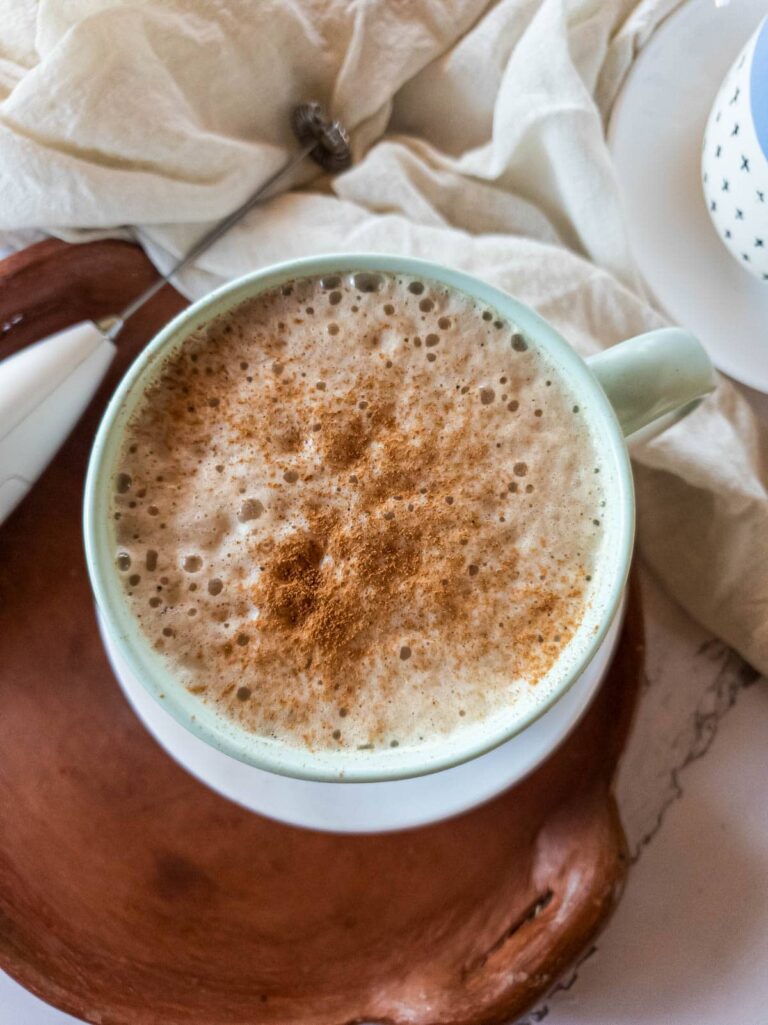 Overhead view of ashwagandha coffee with cheesecloth accent.