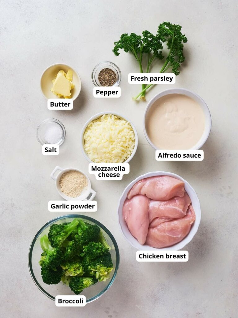 An overhead view of ingredients on a light surface.