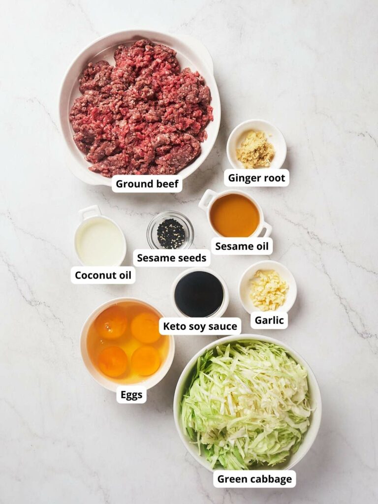 Ingredients for egg roll in a bowl recipe arranged on a countertop.