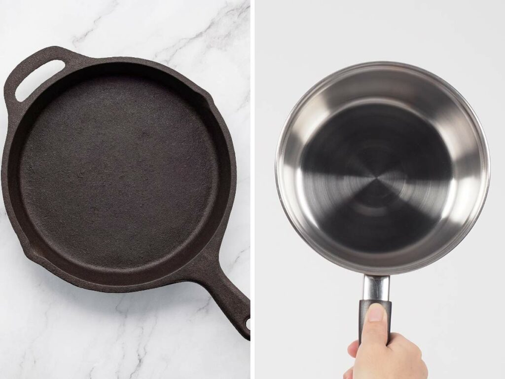 A side-by-side comparison of a black cast iron skillet and a stainless steel frying pan.