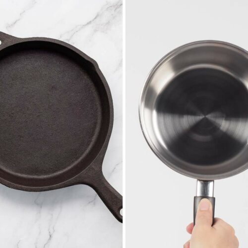 A side-by-side comparison of a black cast iron skillet and a stainless steel frying pan.