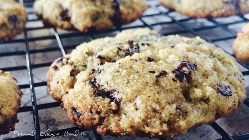 Close-up of healthy chocolate chip cookies with visible chocolate chunks on a cooling rack.