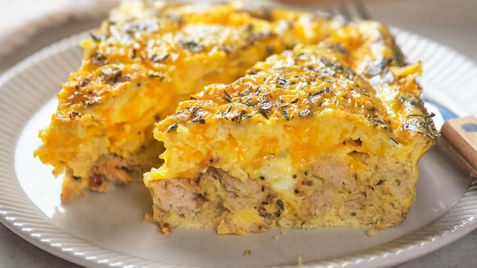 A picture of a portion of keto breakfast casserole on light blue plate.