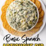 A bowl of spinach artichoke dip is surrounded by round crackers on a plate.